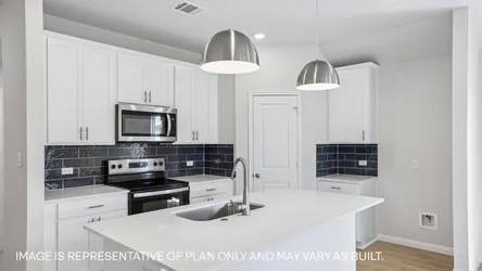 builders/67b9f3b3-3891-4ae1-b7d6-60ce7840e673/communities/96f849f3-42ca-4293-a29a-f7b162dc4b7c/homes/34bfdac9-b0f8-4369-97c6-6fc42c8e478f/ad0ebd85-4fbd-441b-a2a8-0087191d544d-13_125_Southridge_Trail_X40E_Elgin_H_Kitchen.jpg